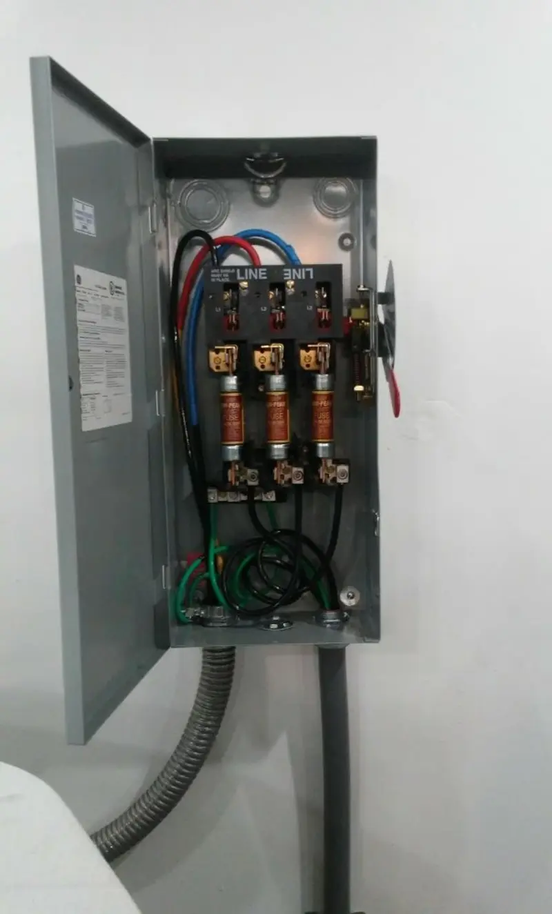 Three-phase disconnect switch installed for Smoke Detector Installation in Pembroke Park